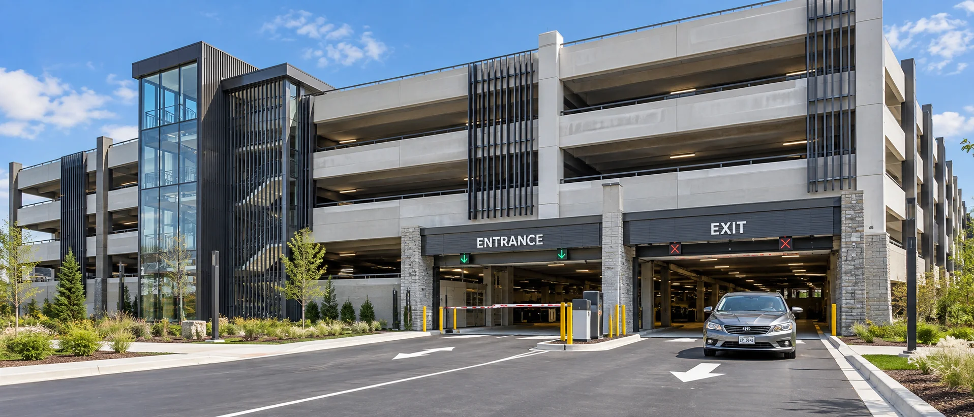 Illustrative modern multi-level parking garage with wide entrance and exit lanes